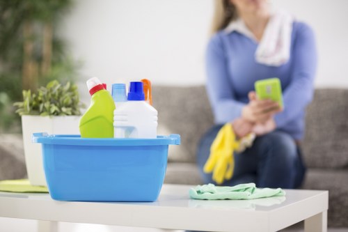 Kitchen surfaces being thoroughly cleaned during deep cleaning