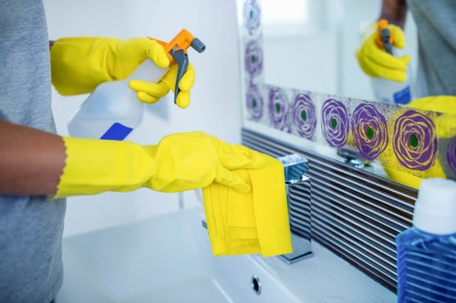 Cleaning technician preparing carpet cleaning equipment