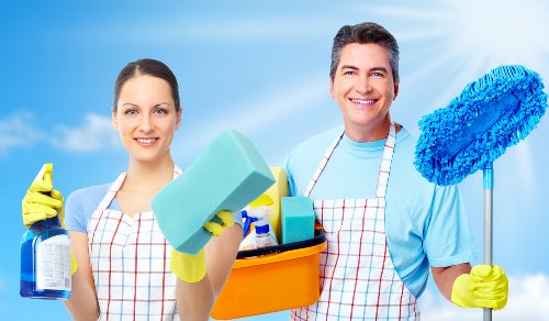 Deep cleaning removing dust and stains from fabric furniture